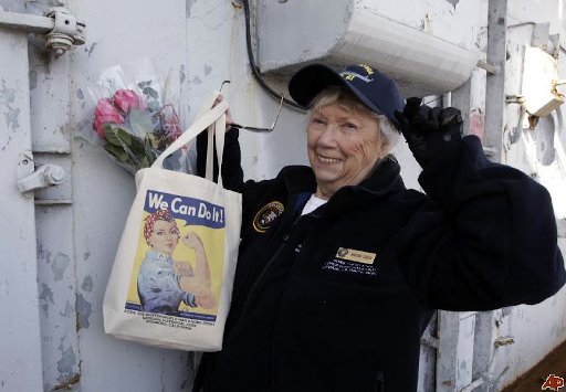 Former World War II Home Front worker Marian McKey Sousa, who drafted blueprints at the Richmond Shipyards, smiles while aboard the USS Iowa in Richmond during a ceremony commemorating the 70th anniversary of the Pearl Harbor attack on Dec. 11, 2011. Paul Sakuma/AP